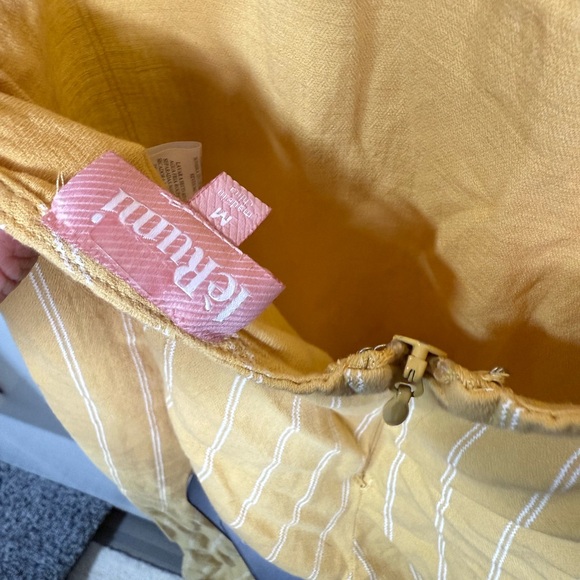 Yellow pinstripe tie back jumpsuit with front ruffle & adjustable straps. Size M - Picture 2 of 8